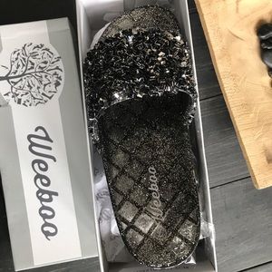 Black glitter slip ons